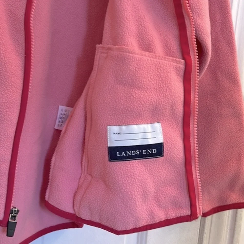 Land’s End girls pink fleece jacket is size medium 10-12